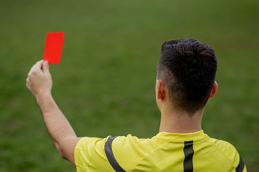 Ref showing a red card