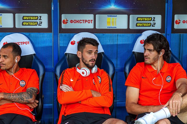 Soccer player on bench