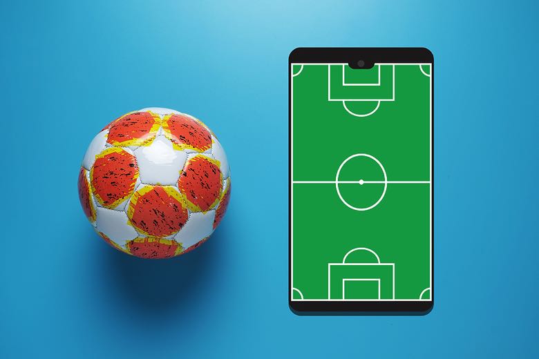 Football next to tablet