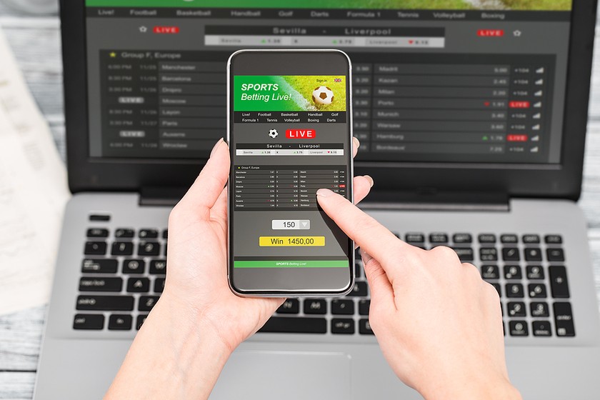Sports Betting on Phone and Laptop