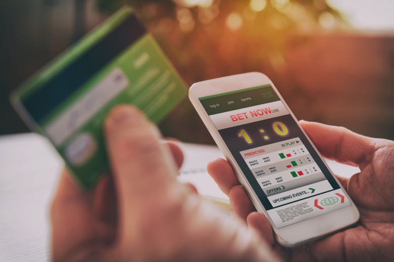Sports betting payment on phone