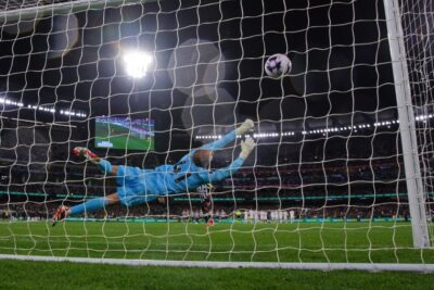 Goalie defending goal