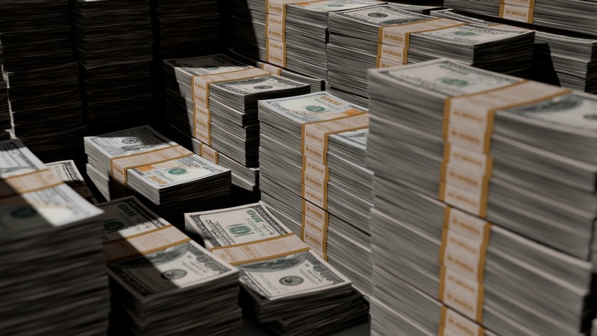 US Dollar Bundles in Dark Room