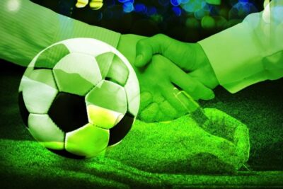 Football transfer handshake
