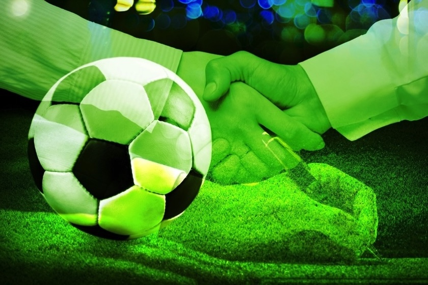 Football transfer handshake