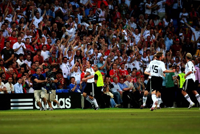 Fans cheering for football goal